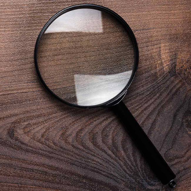 magnifying-glass-on-wooden-background-home-inspection-concept-arleta-ca